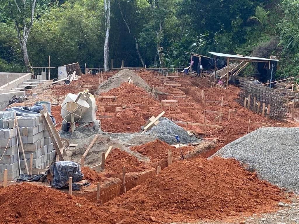Digging and Pouring Footers - Casa Cavu