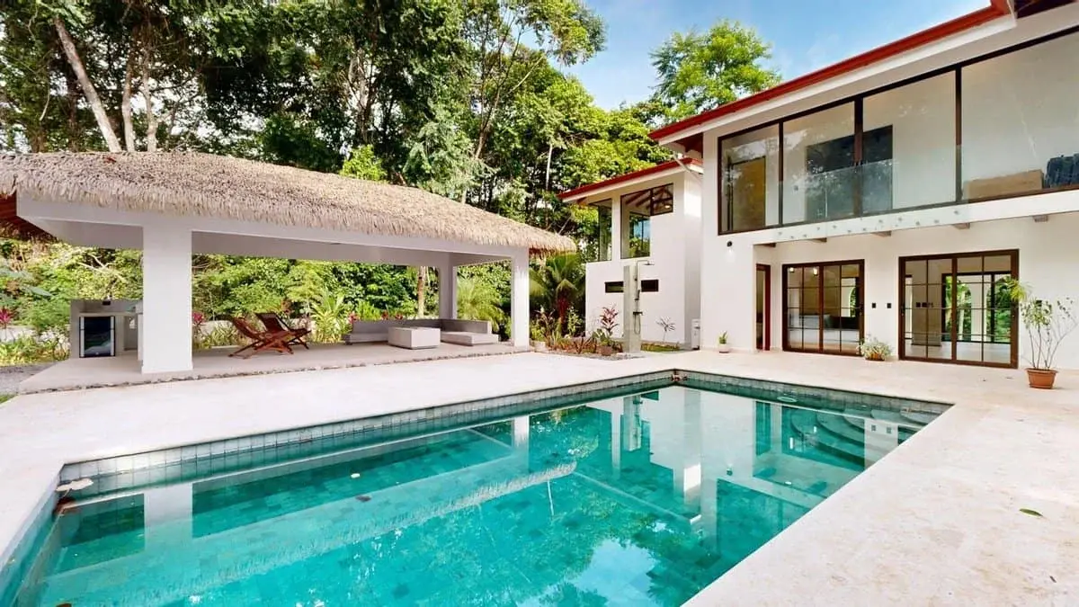 4.2 Acres — 2-Bedroom Modern Tropical Home with Private Pool, Solar Power & Covered Patio | Ojochal property photo 1 in Costa Rica