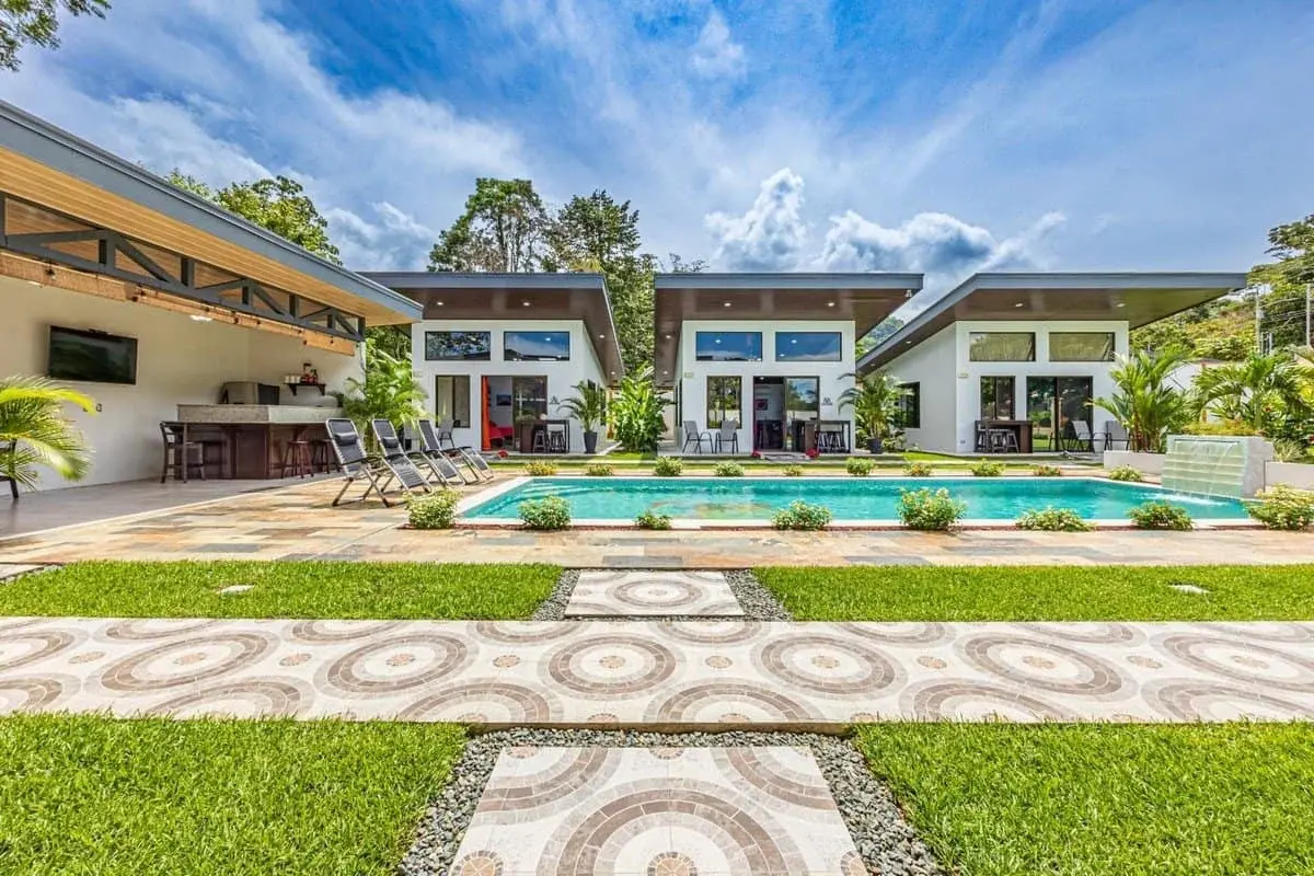 0.3 Acres — 5-Bedroom Turnkey Investment: 3 Rental Villas + 2-Bedroom Home with Large Pool | Uvita property photo 5 in Costa Rica