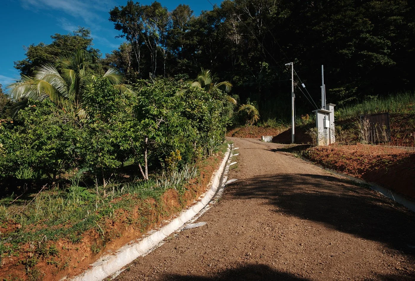 Road Improvement, Drainage & Power Lines Installed – Casa Cavu